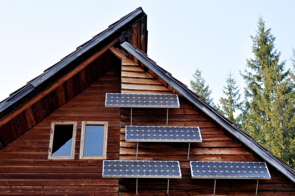 Solar panel on a wooden house